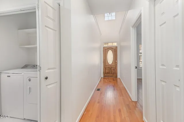 a view of gallery with wooden floor