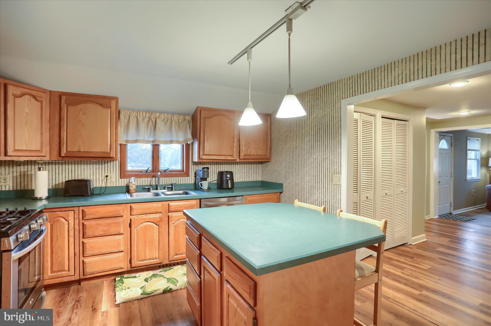 29 Arlene Street Harrisburg, PA 17112 - Photo 12 of 32 a kitchen with a sink a counter space cabinets and appliances