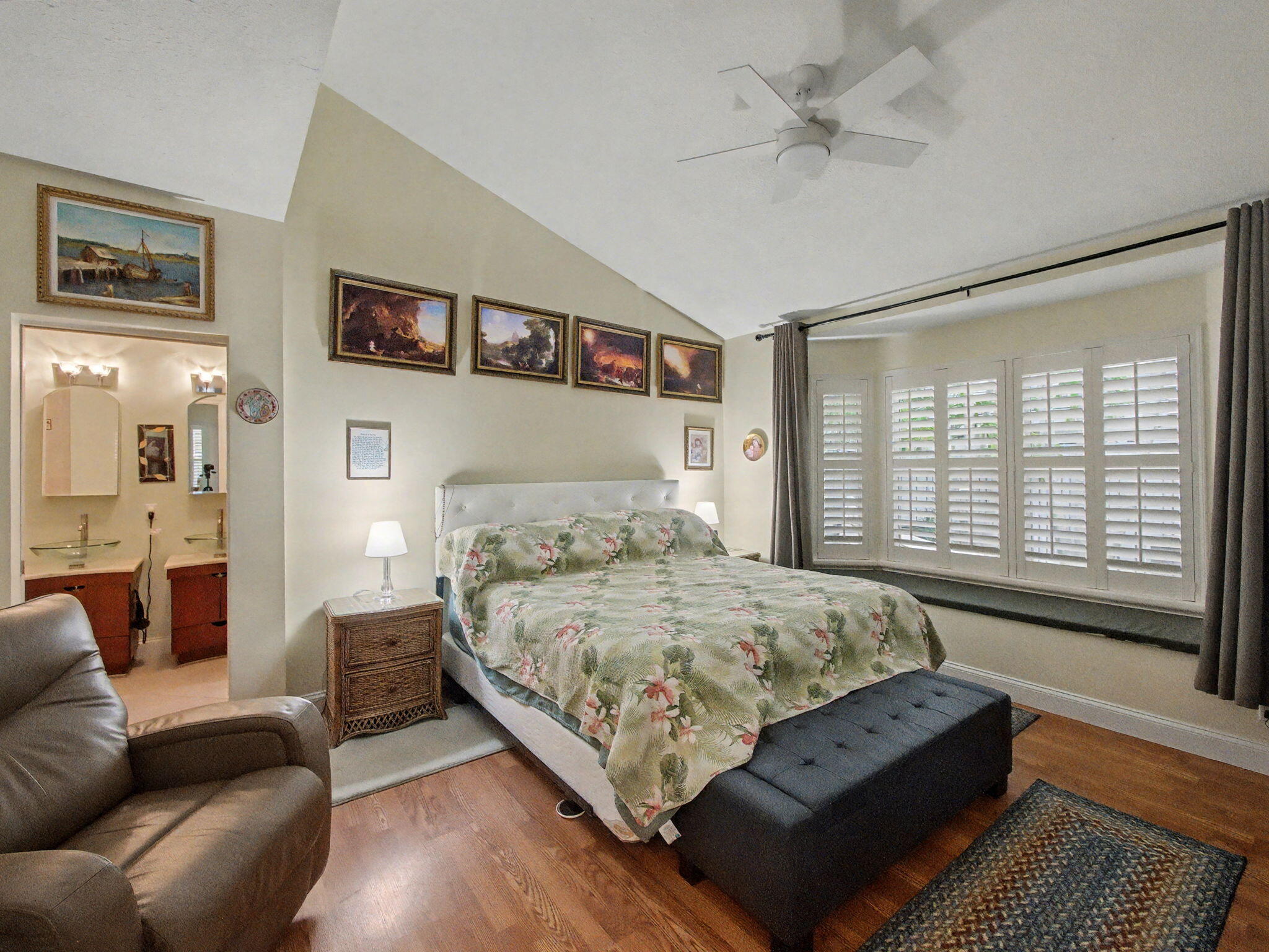 3012 Mainsail Circle Jupiter, FL 33477 - Photo 17 of 33 a bedroom with a large bed couch and a window