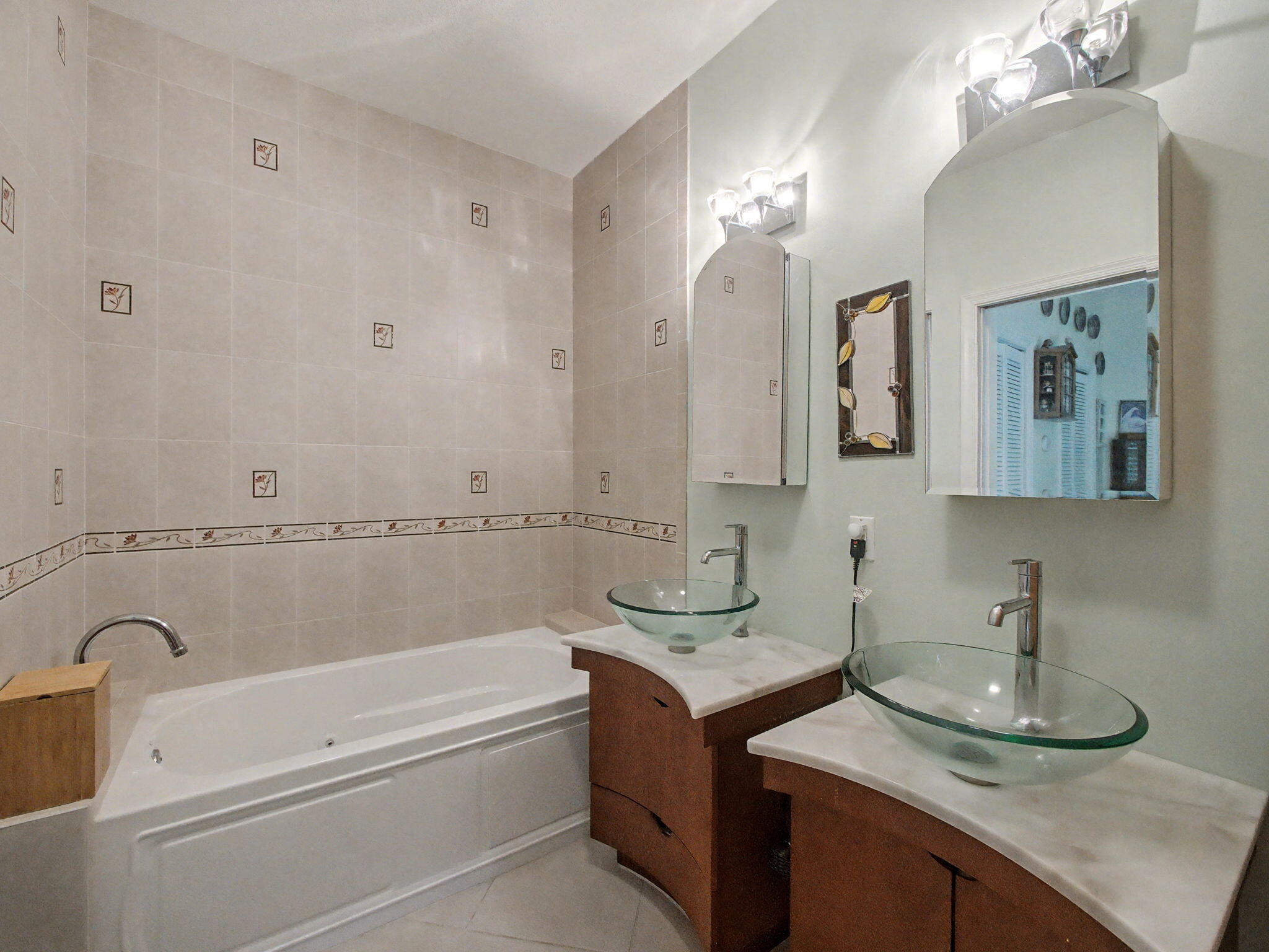 3012 Mainsail Circle Jupiter, FL 33477 - Photo 18 of 33 a bathroom with a granite countertop sink a large mirror and shower
