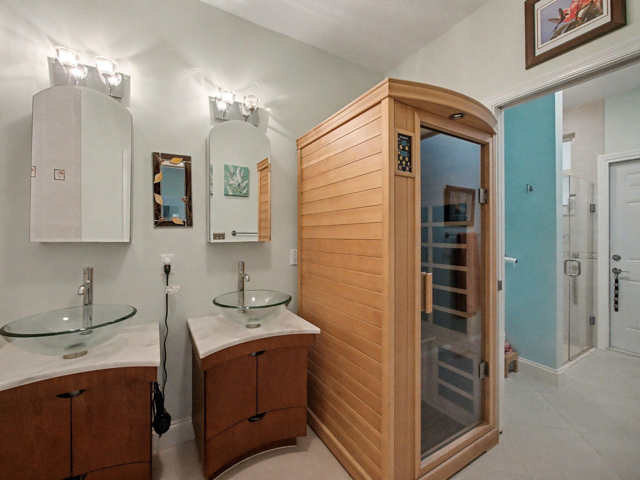 3012 Mainsail Circle Jupiter, FL 33477 - Photo 19 of 33 a bathroom with a sink and a mirror