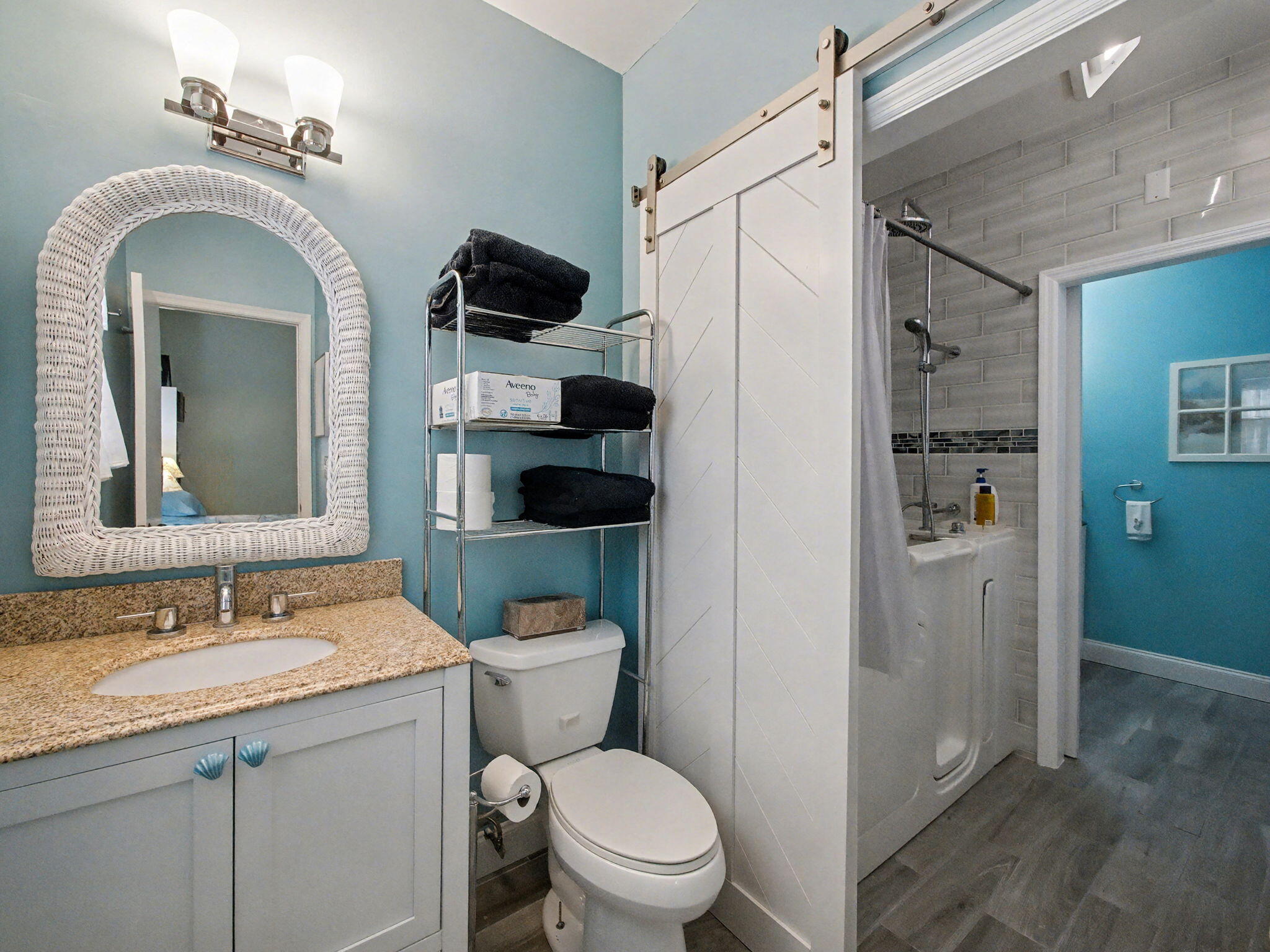 3012 Mainsail Circle Jupiter, FL 33477 - Photo 21 of 33 a bathroom with a granite countertop toilet sink and shower