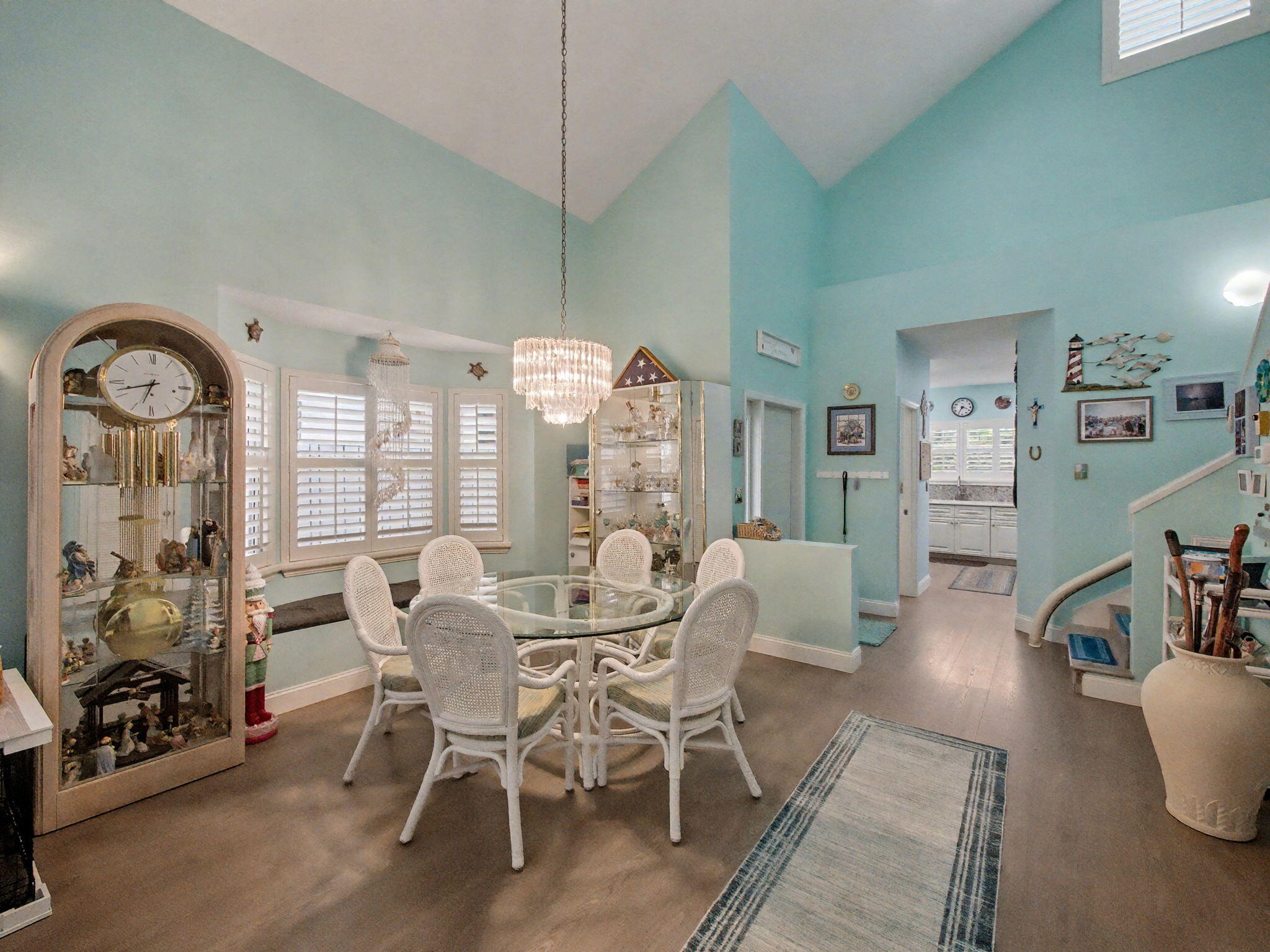 3012 Mainsail Circle Jupiter, FL 33477 - Photo 6 of 33 a view of a dining room with furniture window and wooden floor