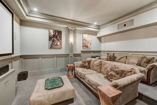 a living room with furniture and a rug