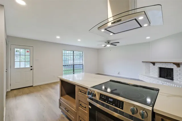 a kitchen with a sink and cabinets