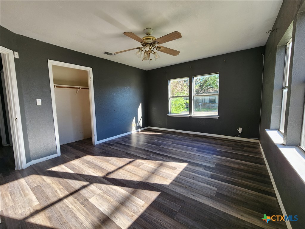 502 North 7th Street Copperas Cove, TX 76522 - Photo 11 of 22 a view of a livingroom with wooden floor and window