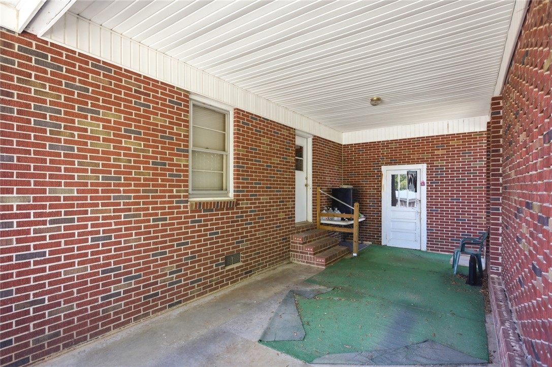 282 West Bennett Road Westminster, SC 29693 - Photo 32 of 42 This covered patio offers a private outdoor space, perfect for relaxing.