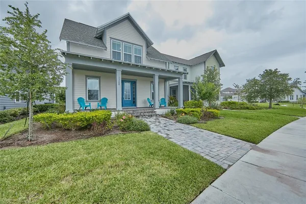 a bedroom with a bed and flat screen tv