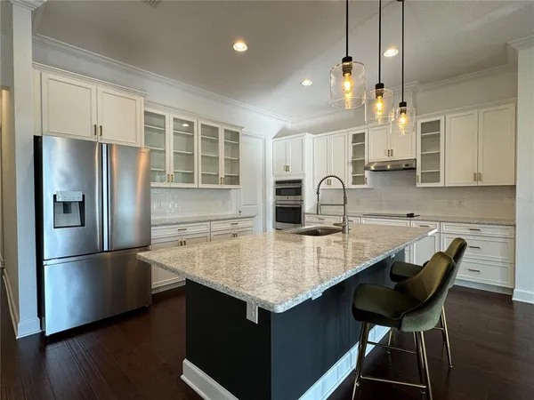 a view of a house with backyard from a patio