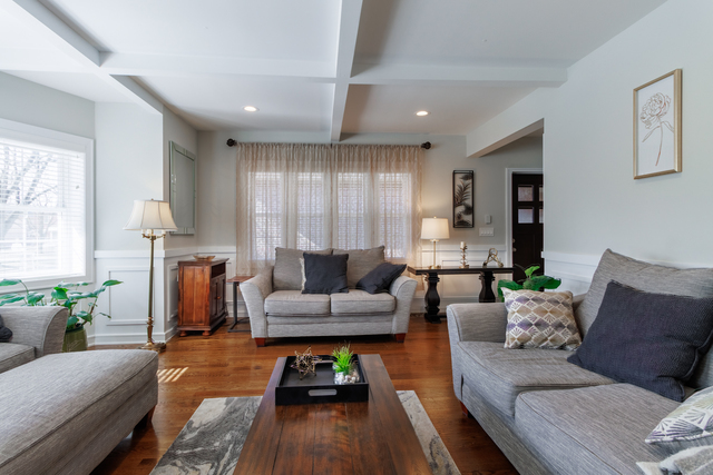 1746 West 104th Place Chicago, IL 60643 - Photo 11 of 58 a living room with furniture and a wooden floor