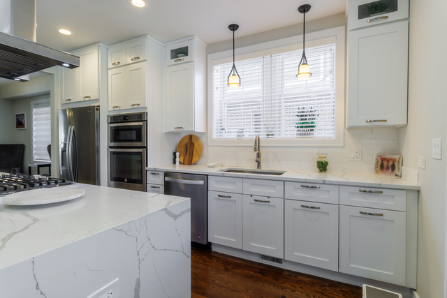 1746 West 104th Place Chicago, IL 60643 - Photo 16 of 58 a kitchen with refrigerator a sink and cabinets