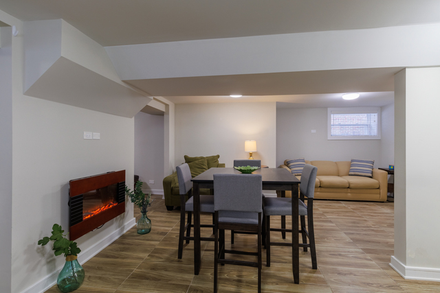 1746 West 104th Place Chicago, IL 60643 - Photo 45 of 58 a view of a dining room with furniture and wooden floor