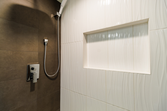 1746 West 104th Place Chicago, IL 60643 - Photo 49 of 58 a bathroom with a shower and a sink