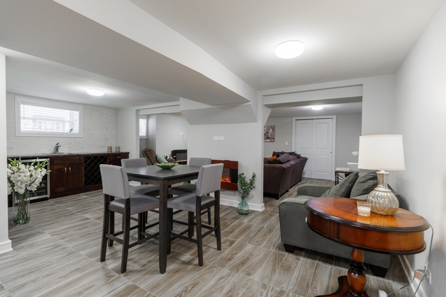 1746 West 104th Place Chicago, IL 60643 - Photo 51 of 58 a view of a dining room with furniture and wooden floor