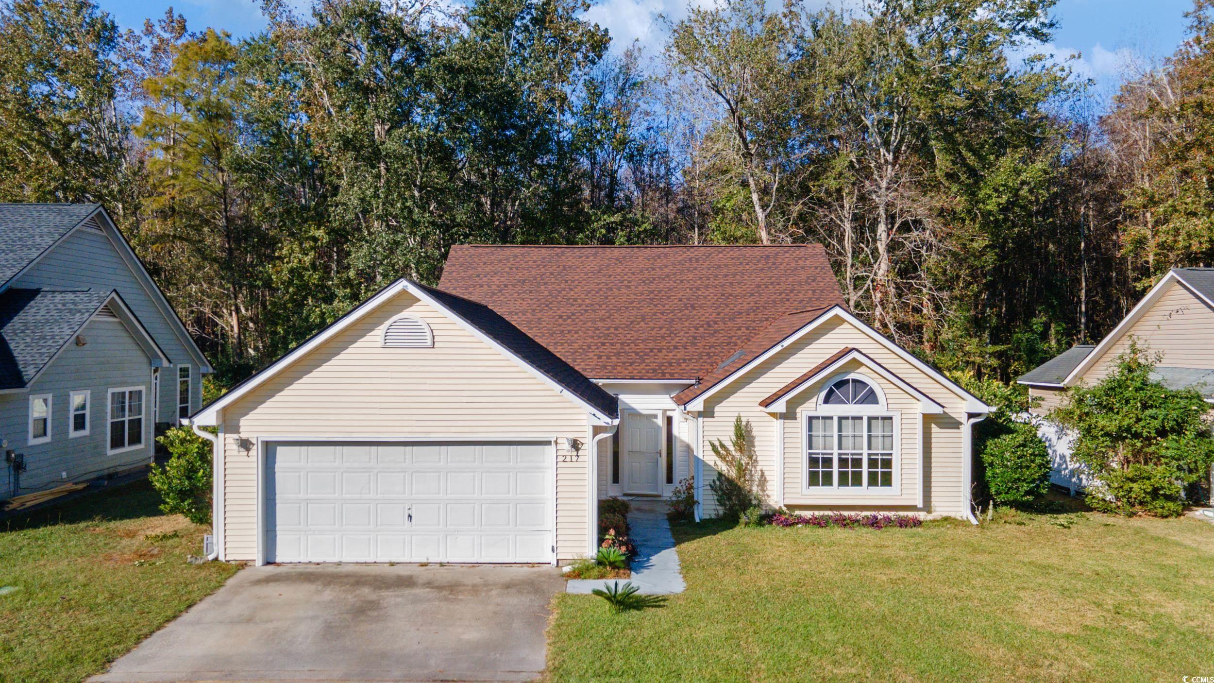 217 Nature Trail Little River, SC 29566 - Photo 1 of 37 Single story home featuring a front lawn and a gar
