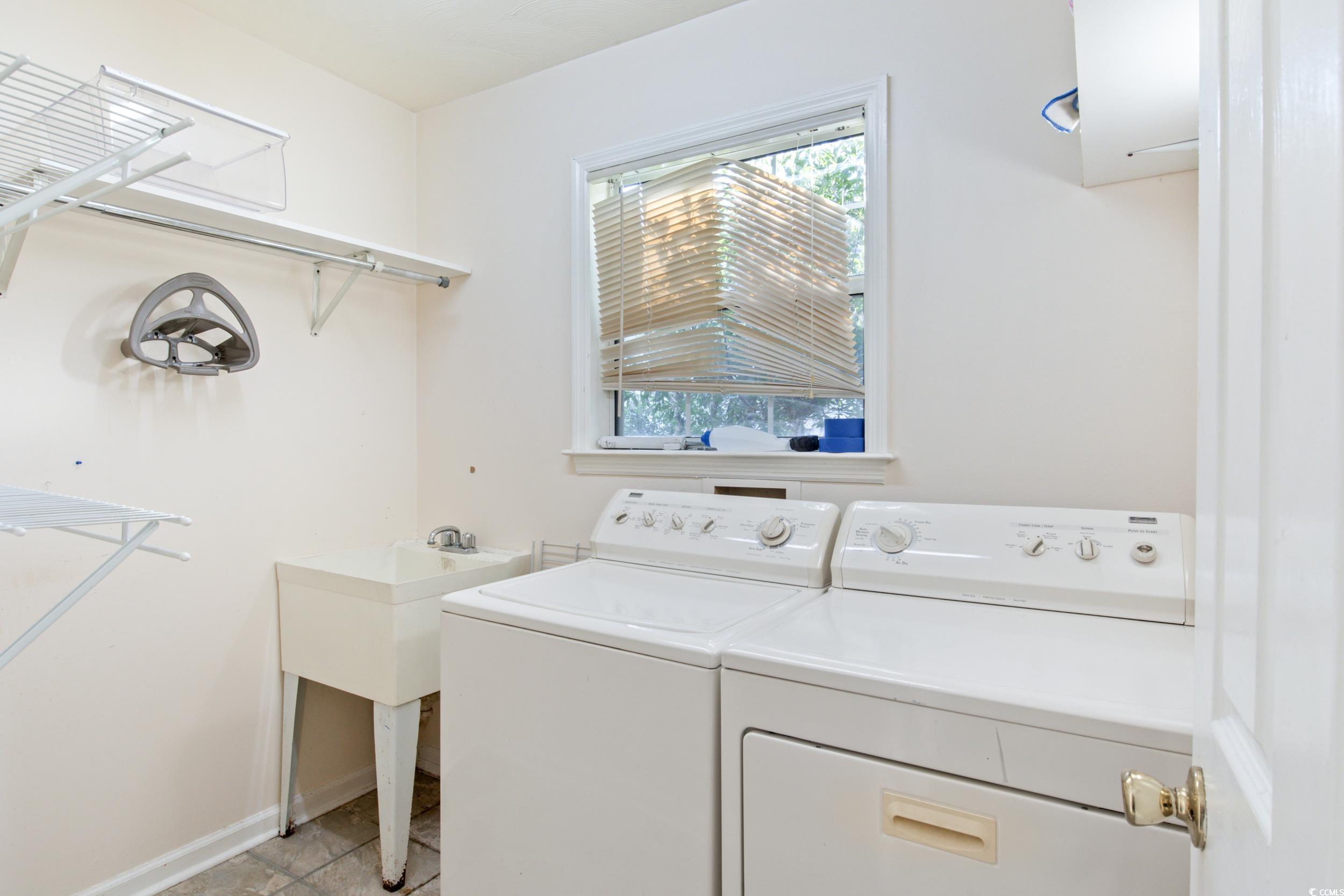 217 Nature Trail Little River, SC 29566 - Photo 28 of 37 Laundry area featuring light tile patterned floori