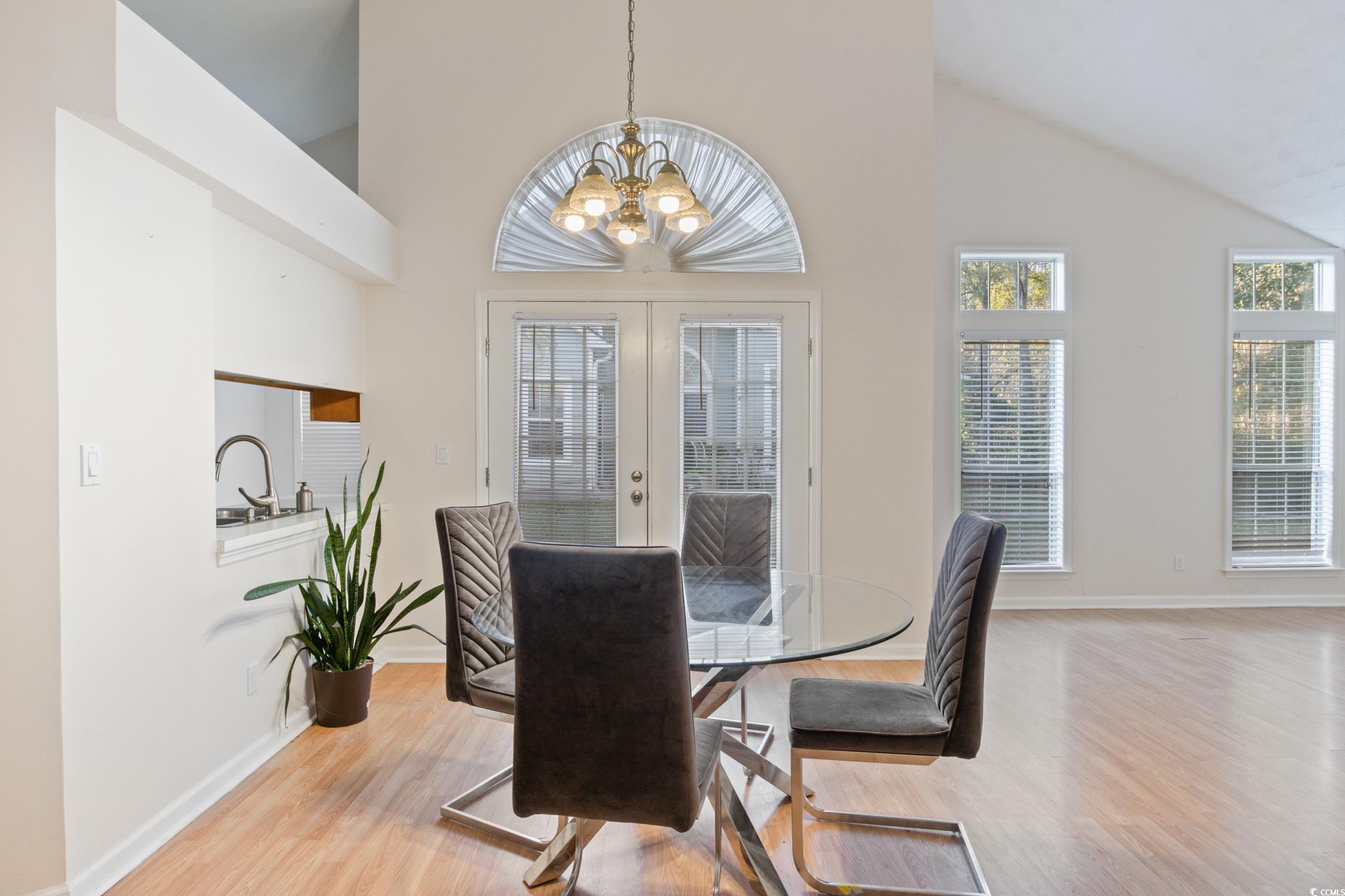 217 Nature Trail Little River, SC 29566 - Photo 5 of 37 Dining area featuring high vaulted ceiling, light