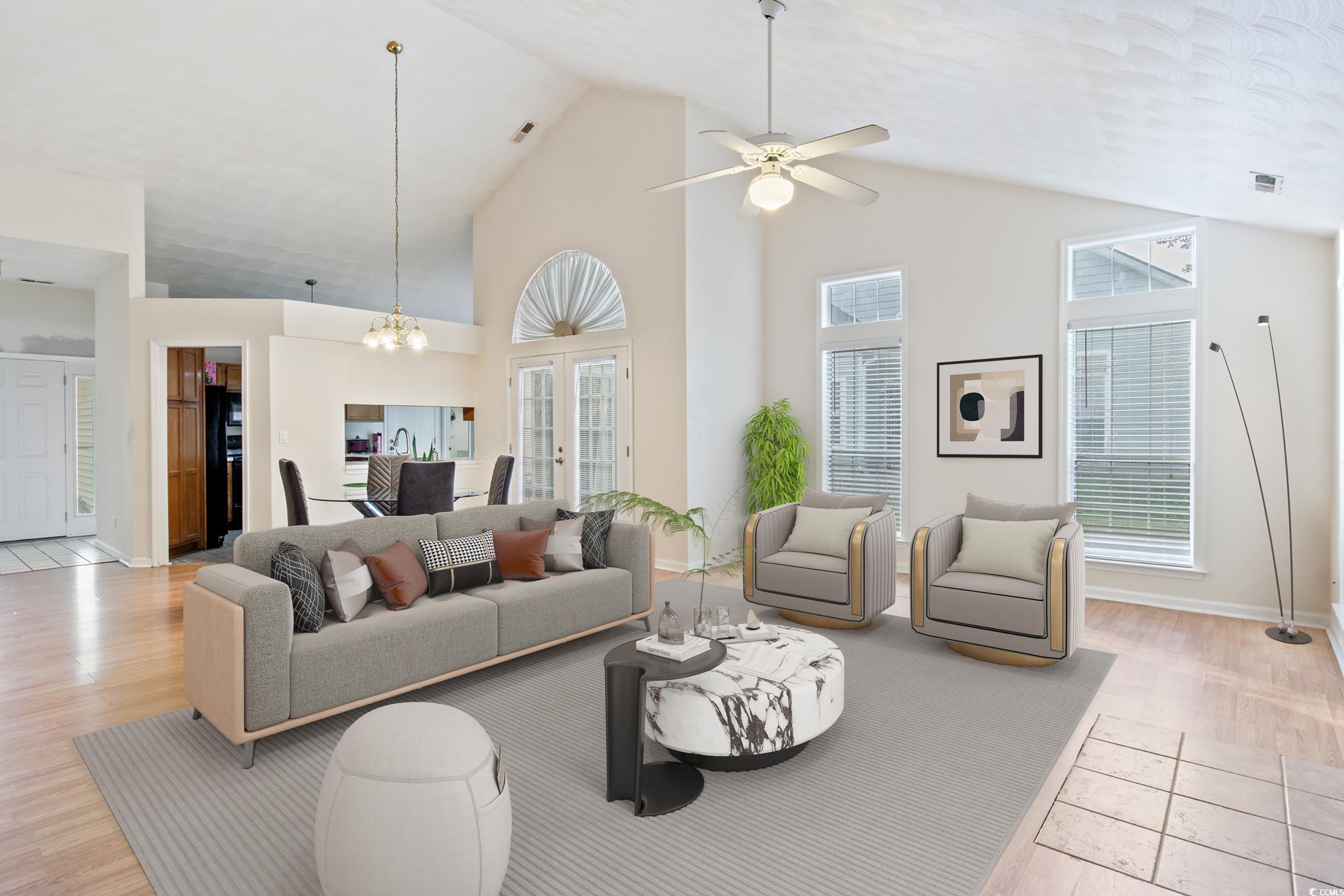 217 Nature Trail Little River, SC 29566 - Photo 8 of 37 Living room with high vaulted ceiling, light wood-