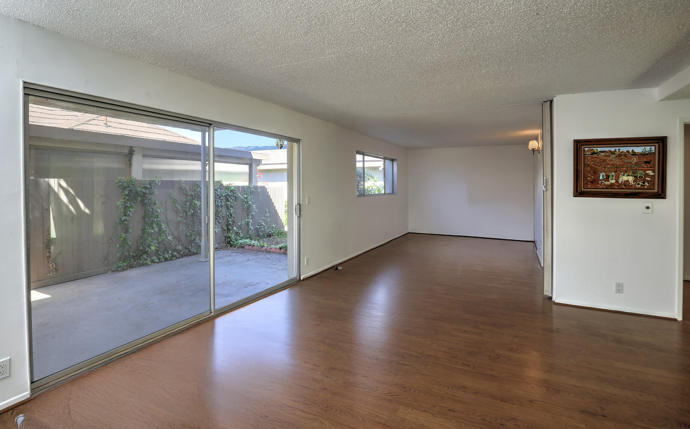 5722 Encina Road, Unit 3 Goleta, CA 93117 - Photo 6 of 19 Large Sliding Glass Doors To Patio