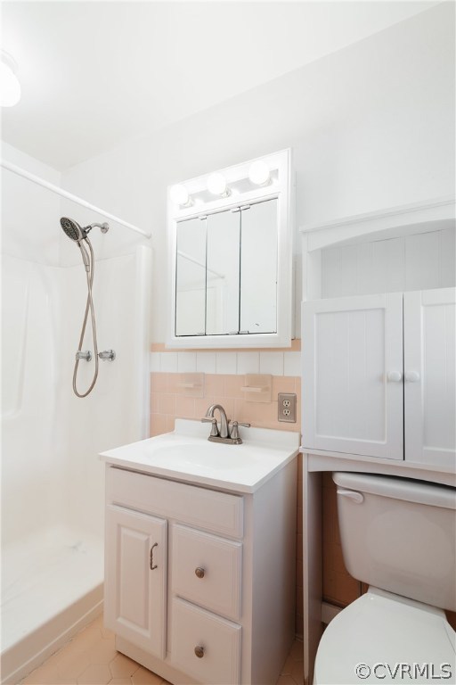 10840 Qualla Road Chesterfield, VA 23832 - Photo 26 of 41 a bathroom with a sink a toilet and vanity
