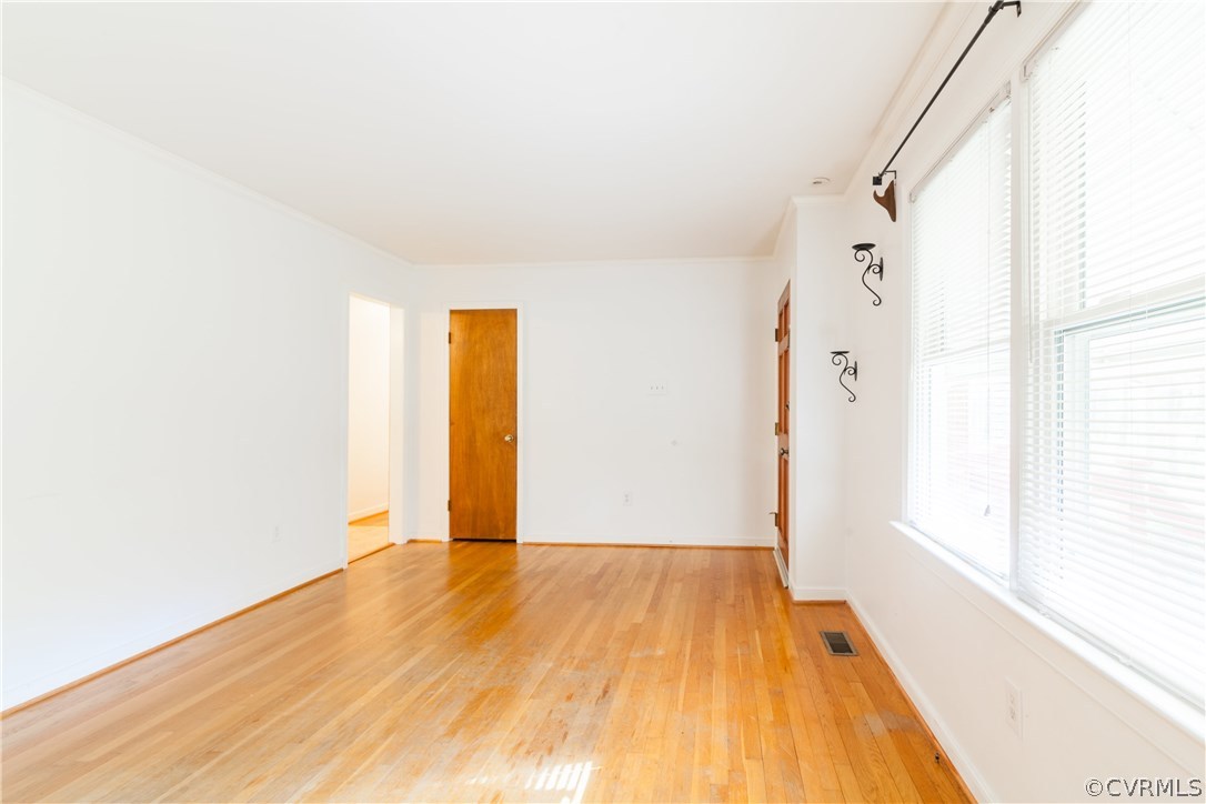 10840 Qualla Road Chesterfield, VA 23832 - Photo 8 of 41 a view of a room with wooden floor and a bathroom