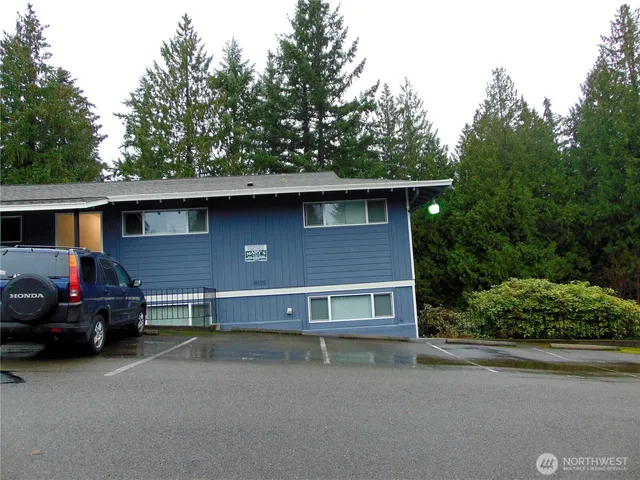 a car parked in front of a house