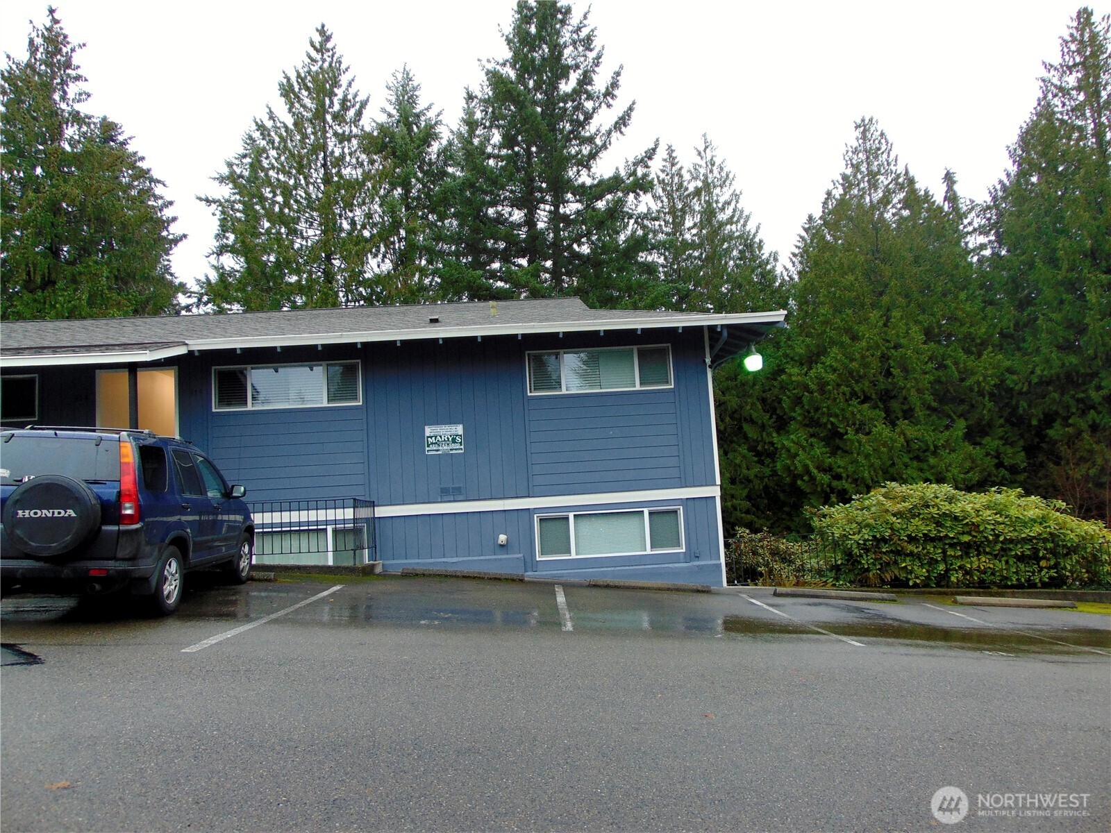 303 Poppy Road Bothell, WA 98012 - Photo 13 of 22 a view of a car park in front of house