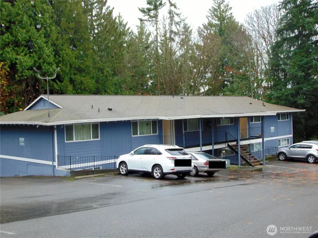 a car parked in front of a house