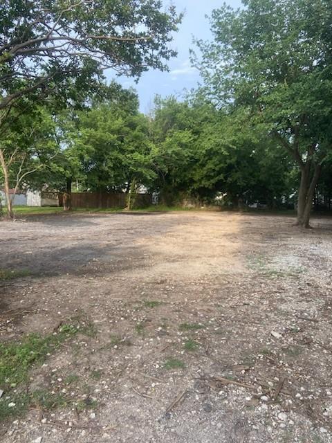 104 South Lamar Street Tioga, TX 76271 - Photo 7 of 10 a view of dirt yard with a trees