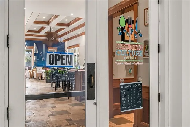 a view of a entryway and dining room