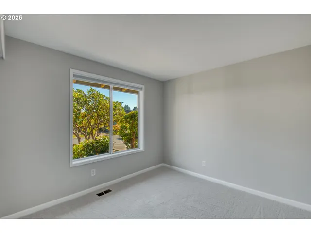 a bathroom with a sink vanity and a bathtub