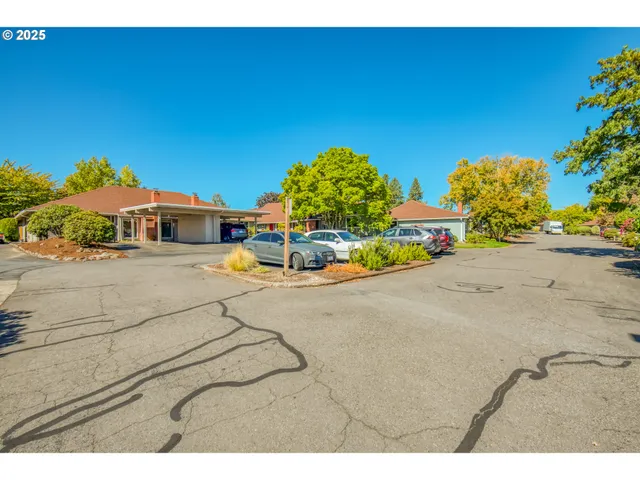 a view of a hall with a car park