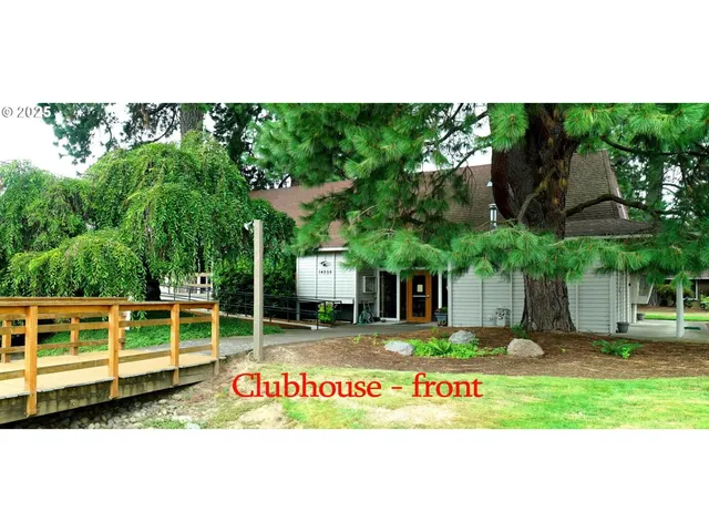 an aerial view of a house with a garden