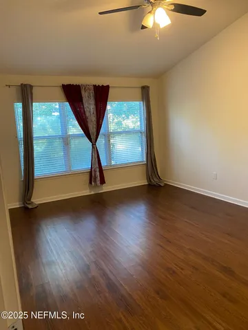 a bathroom with a shower and a shower head