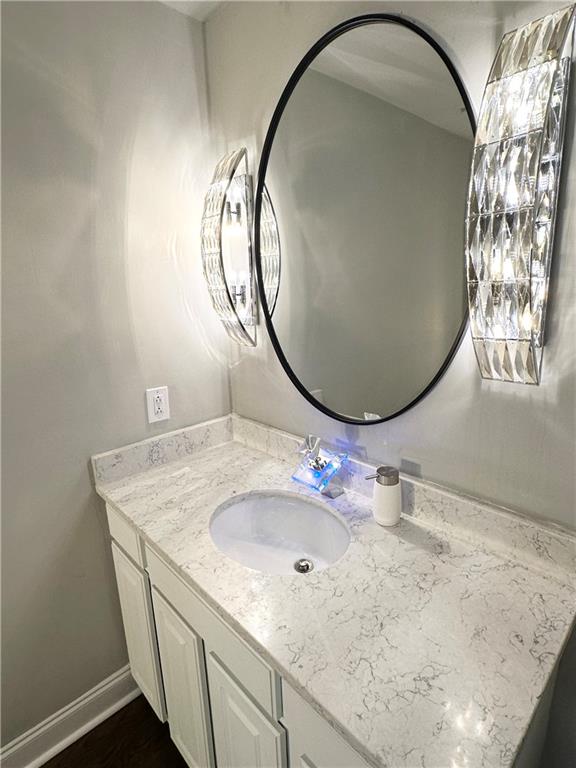 3823 Paces Ferry West Atlanta, GA 30339 - Photo 13 of 33 a bathroom with a sink and a mirror