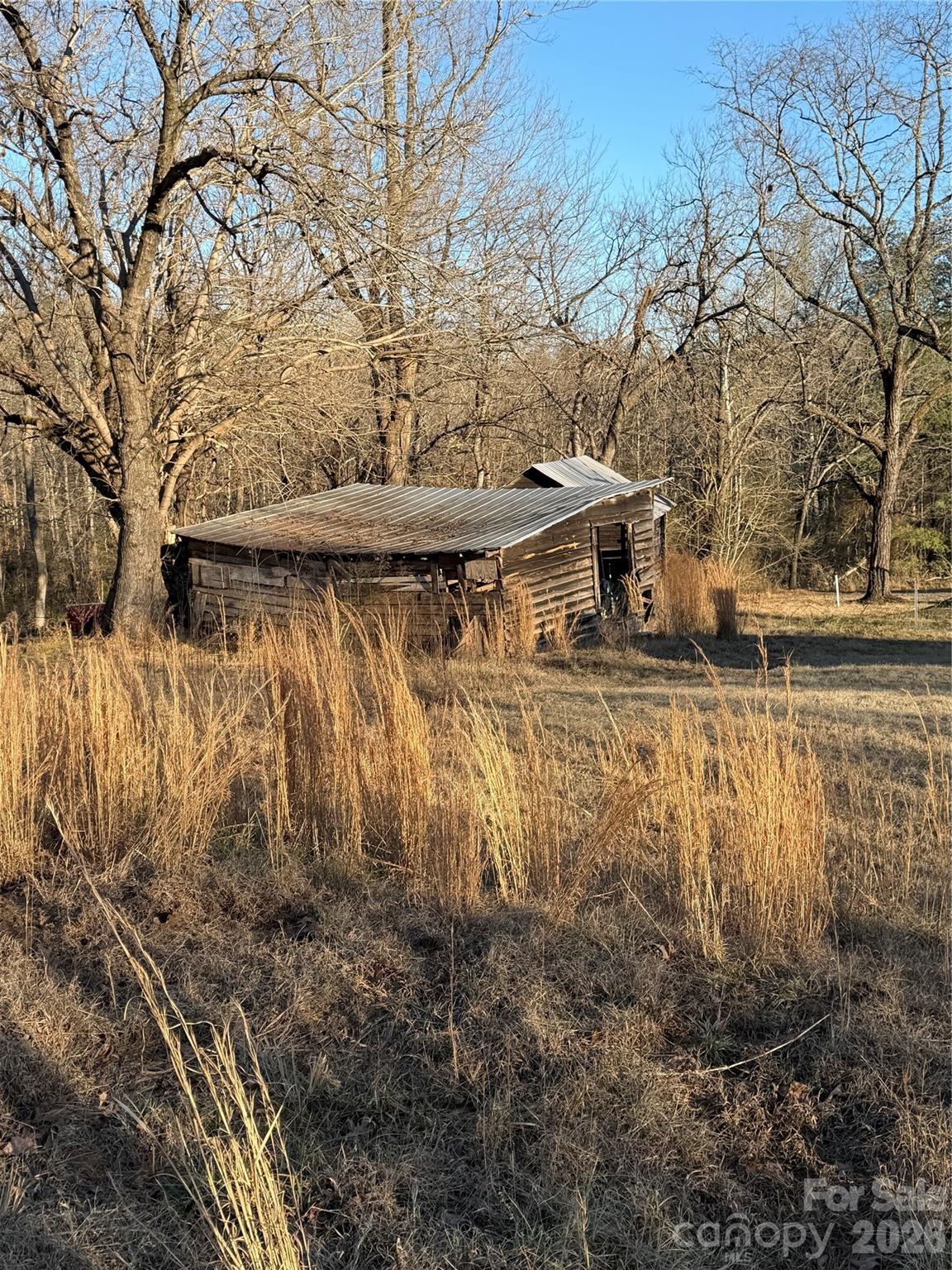 0 Ramsey Road Connelly Springs, NC 28612 - Photo 1 of 6 a view of a yard with wooden fence