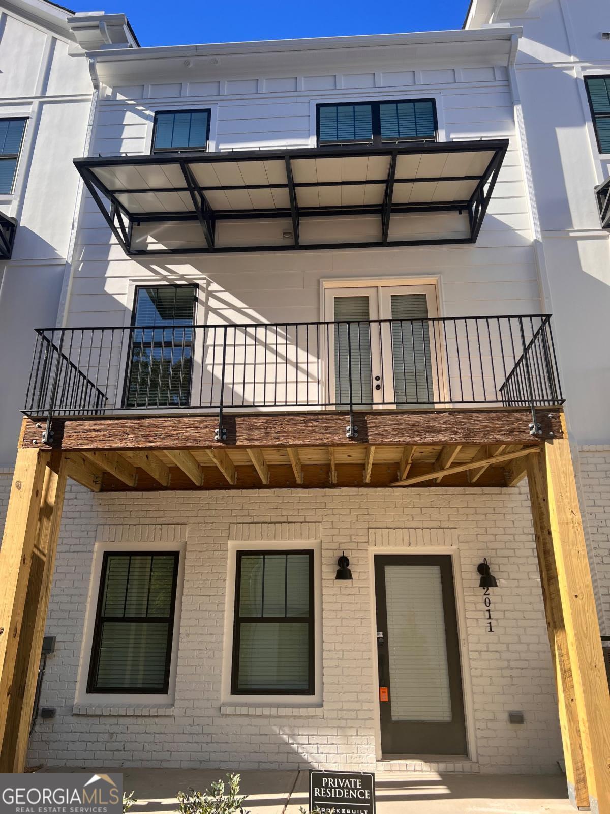 2011 Oak Lane Northeast Atlanta, GA 30318 - Photo 1 of 15 a view of a roof deck