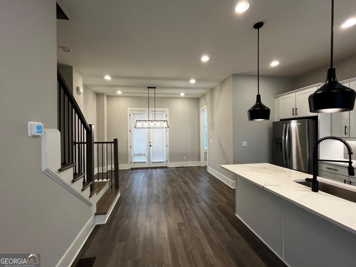 2011 Oak Lane Northeast Atlanta, GA 30318 - Photo 5 of 15 a view of kitchen with cabinets and wooden floor