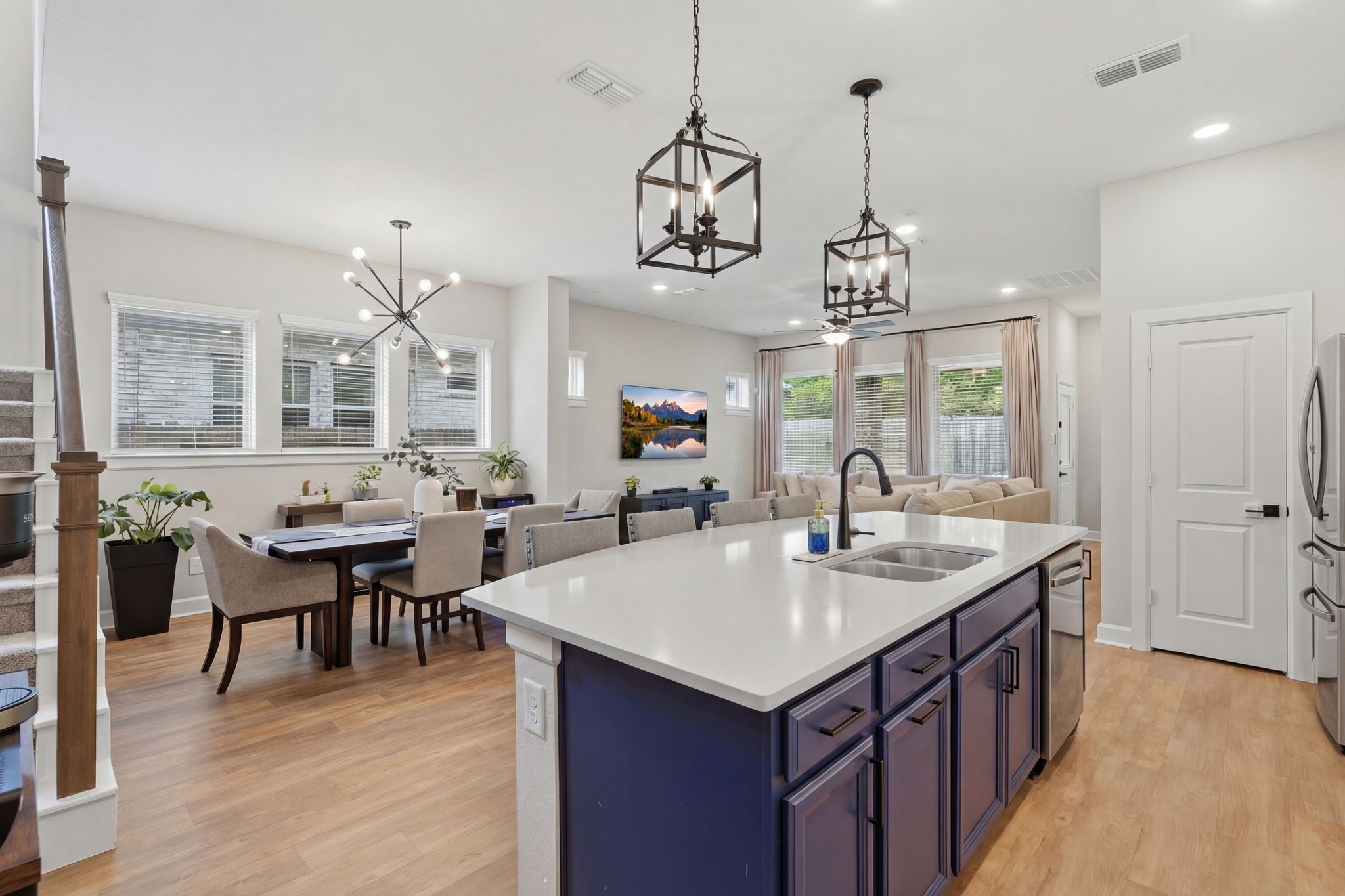 24423 Morningside Terrace Tomball, TX 77375 - Photo 4 of 47 a kitchen with center island table and chairs in it