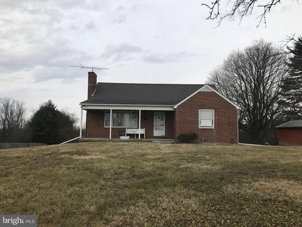2622 Pleasantville Road Fallston, MD 21047 - Photo 1 of 29 a front view of a house with a yard