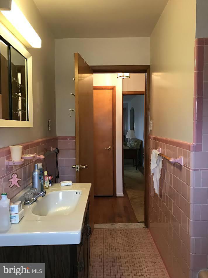 2622 Pleasantville Road Fallston, MD 21047 - Photo 14 of 29 a bathroom with a sink and a mirror