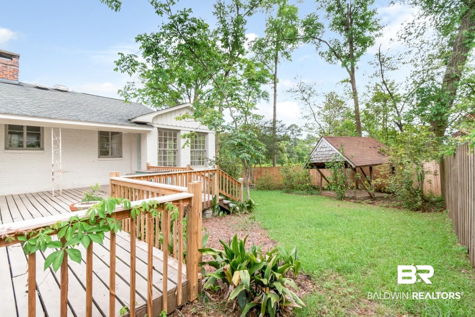 4 Turnout Lane Mobile, AL 36608 - Photo 33 of 53 Fenced backyard featuring a wooden deck