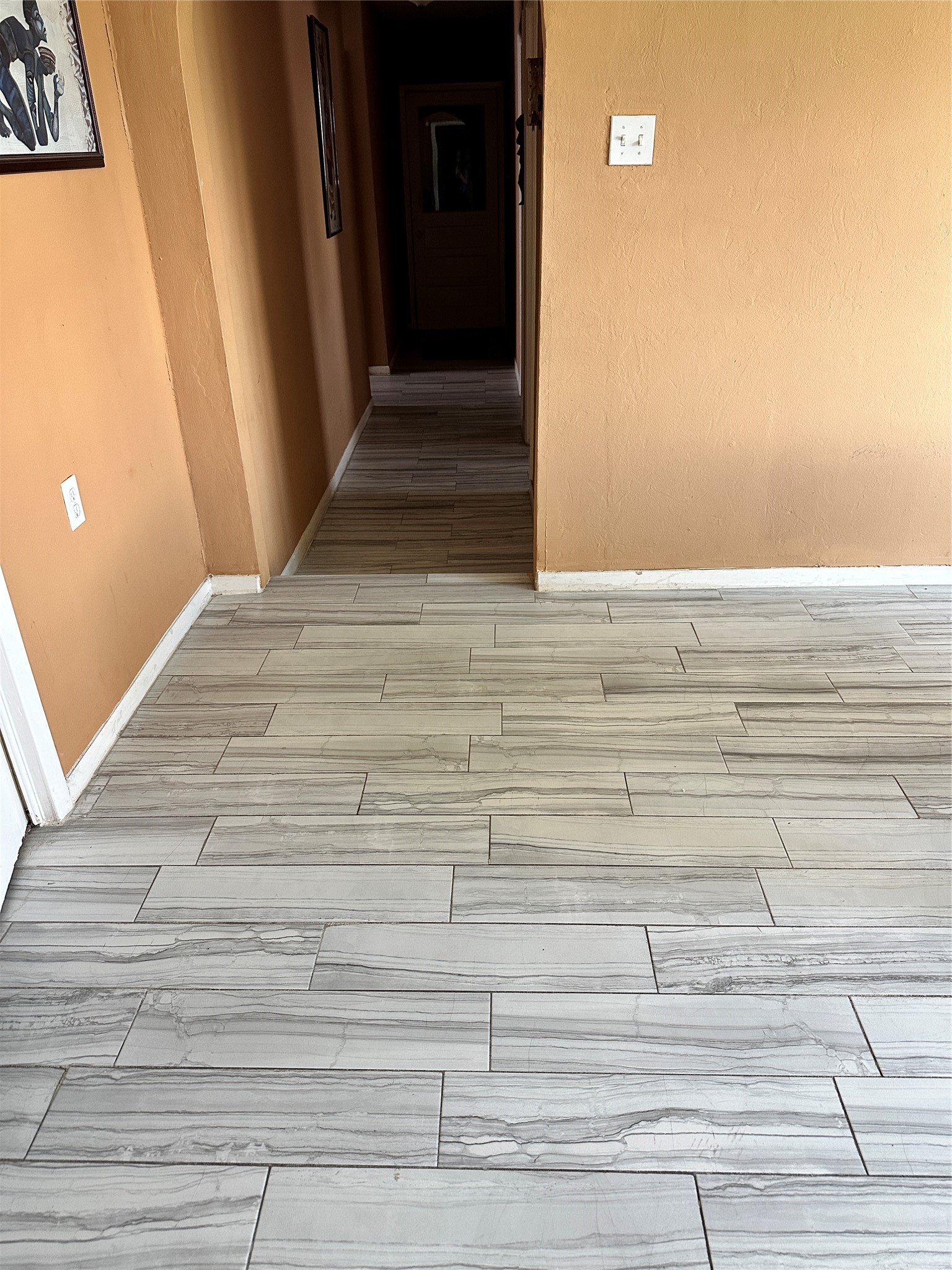 3802 Wichita Street, Unit 1 Houston, TX 77004 - Photo 4 of 10 New tile in kitchen, dining room and hallway