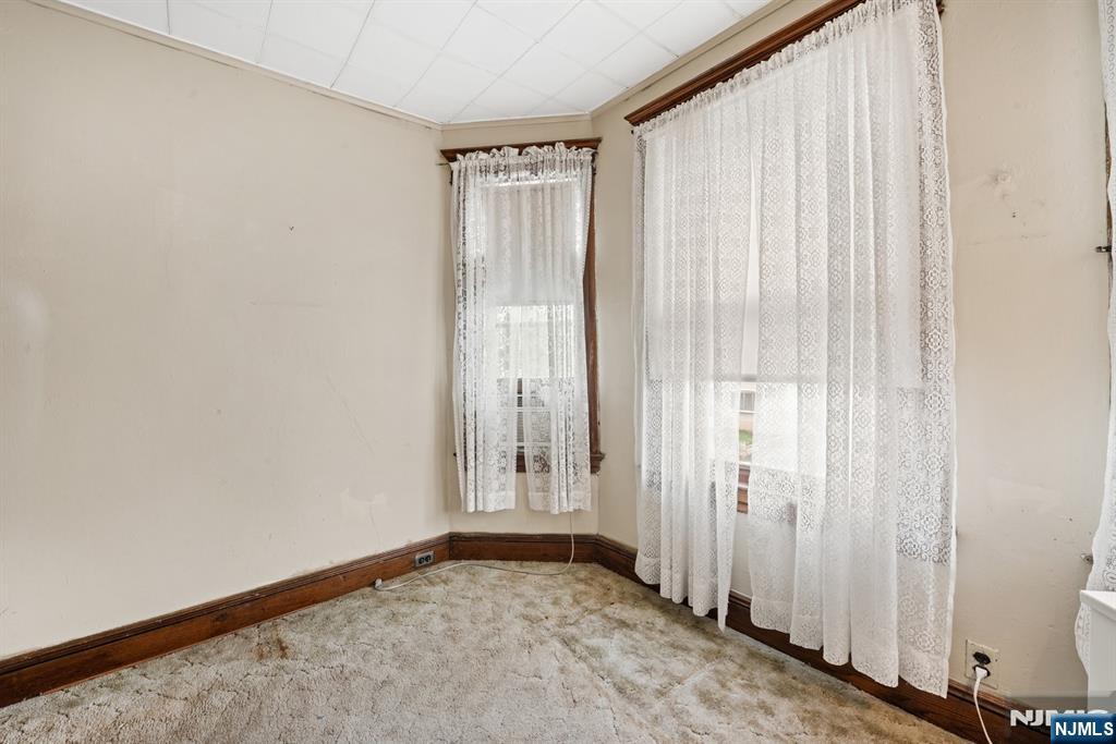 10 Beech Street Rutherford, NJ 07070 - Photo 35 of 41 an empty room with windows