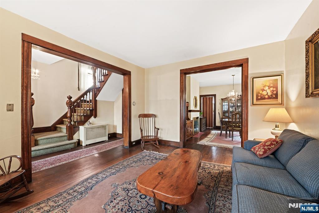 10 Beech Street Rutherford, NJ 07070 - Photo 6 of 41 a living room with furniture a rug and glass windows