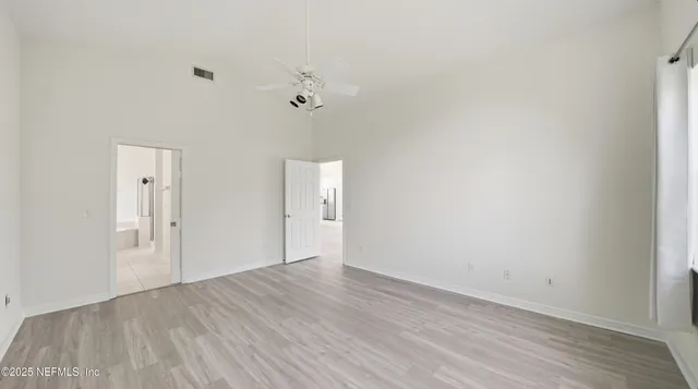 a bathroom with a sink double vanity and a bathtub