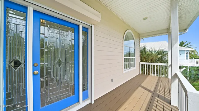a living room with fireplace furniture and a wooden floor