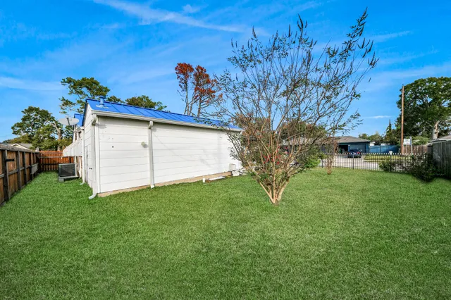 a view of a backyard with a garden