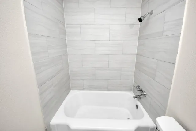 a bathroom with a bathtub