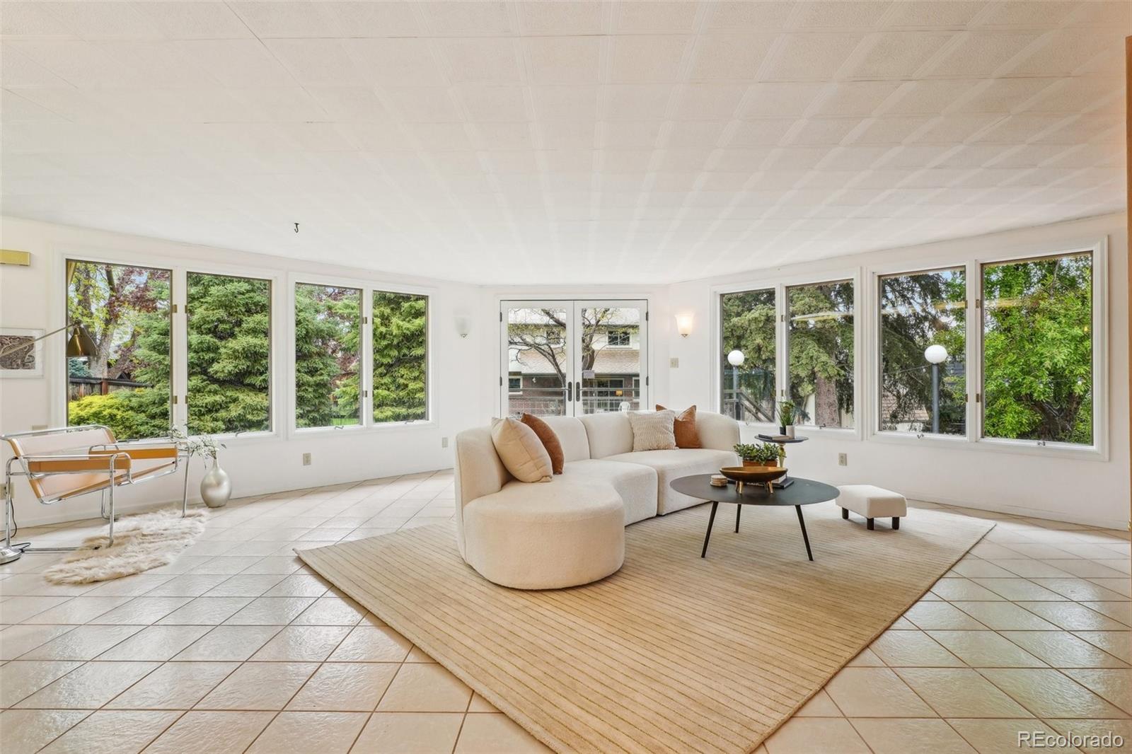 1118 Eagle Road Broomfield, CO 80020 - Photo 15 of 50 a living room with furniture and large windows